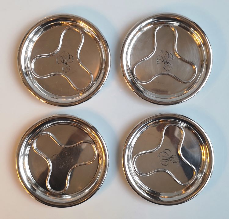 4 dessous de bouteilles Christofle
