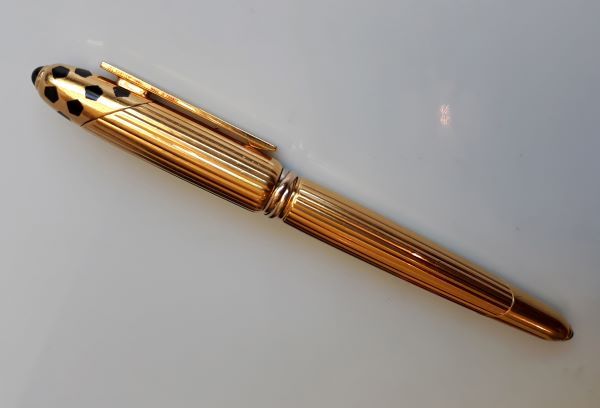 stylo panthère cartie plaqué or plume or